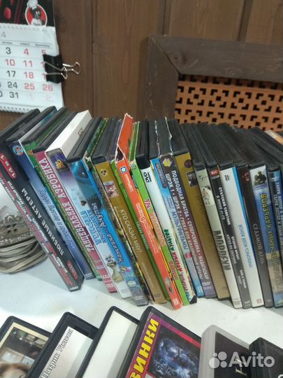 50 дисков с фильмами и мультфильмами набор