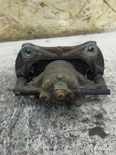 Тормозной суппорт передний левый Opel Astra J