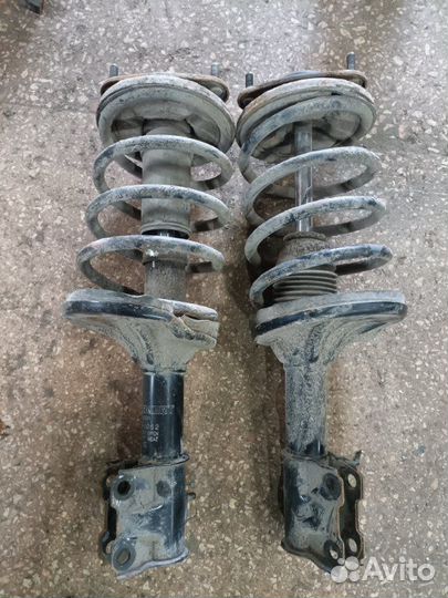 Стойка подвески передняя Mitsubishi Lancer 9