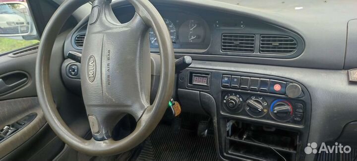 Kia sephia салон