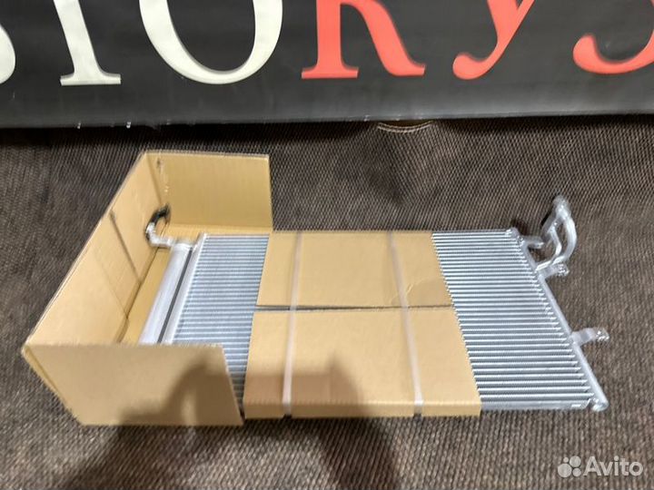 Радиатор кондиционера передний Kia Cerato 2004