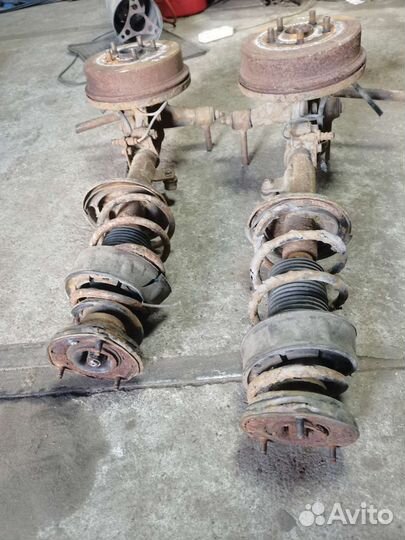 Задние стойки Toyota carina e