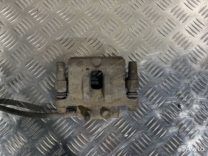 Тормозной суппорт задний mitsubishi lancer 10