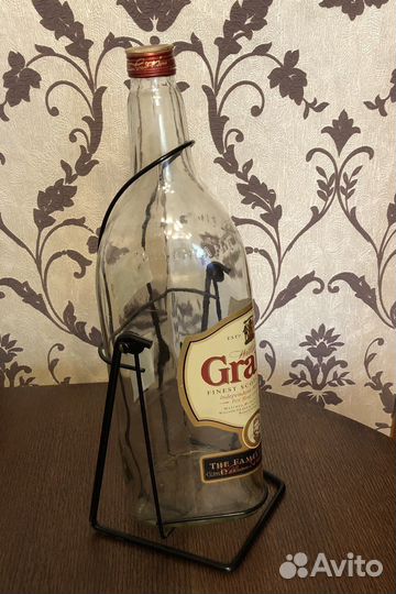 Бутылка на качелях