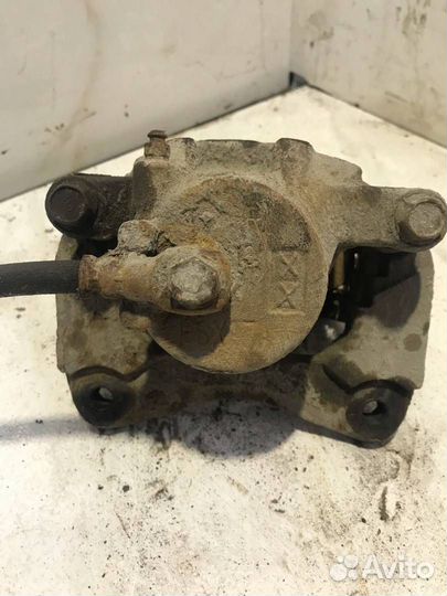 Суппорт тормозной передний левый Mitsubishi