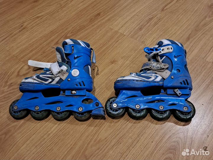 Роликовые коньки