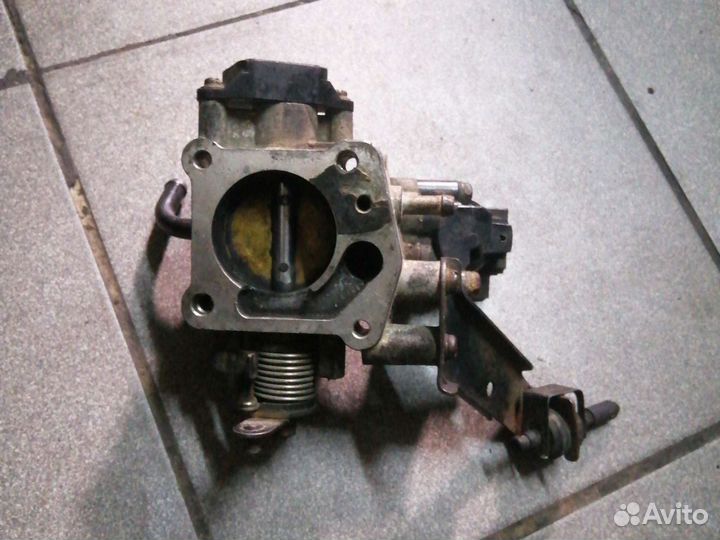 Дроссельная заслонка Киа Спектра