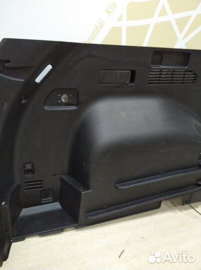Обшивка багажника левая Hyundai Tucson 4 NX4
