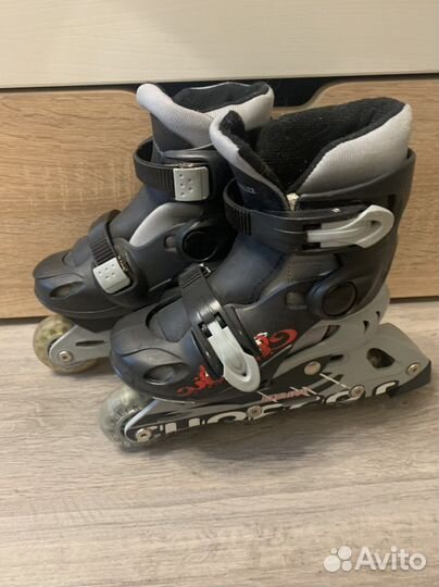 Роликовые коньки