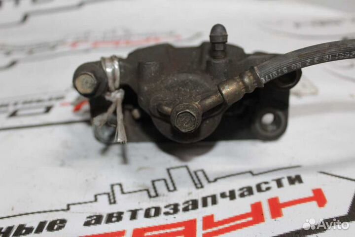 Суппорт В сборе nissan primera X-trail NT30 PNT30