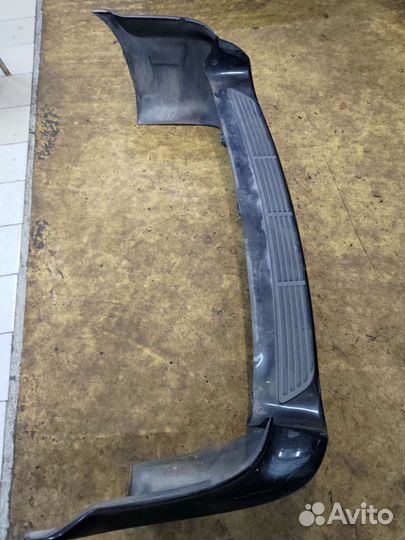 Бампер задний Додж караван Вояджер 07г