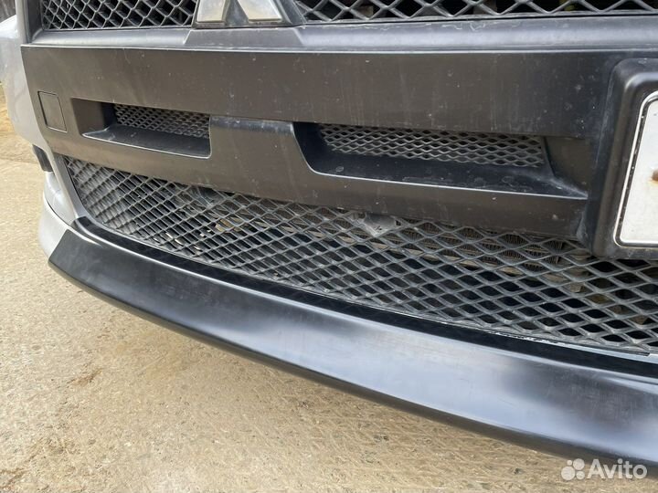 Lancer 10 вставка между клыками новая