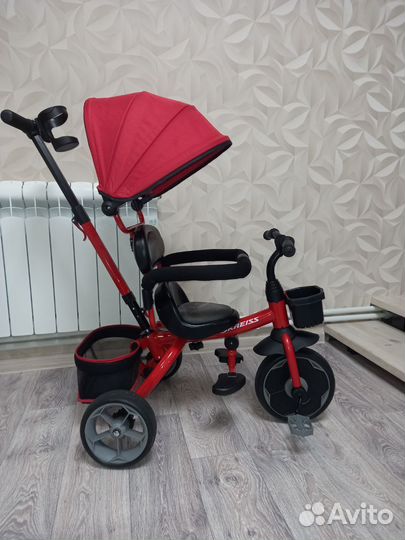 Трехколесный велосипед складной с ручкой