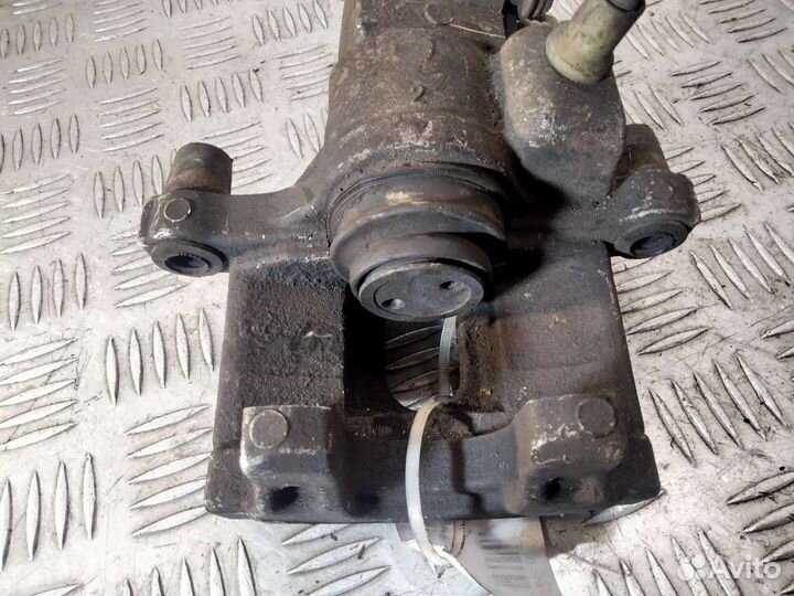 Суппорт задний левый Ford Tourneo Connect