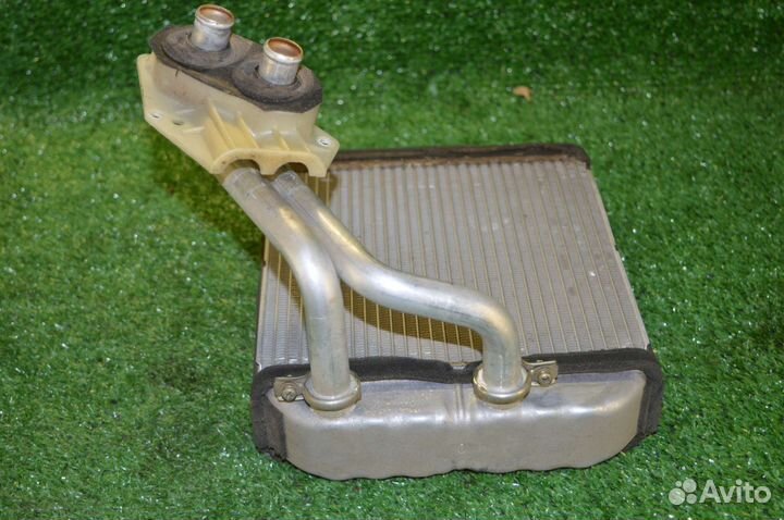 Радиатор печки Mitsubishi Carisma