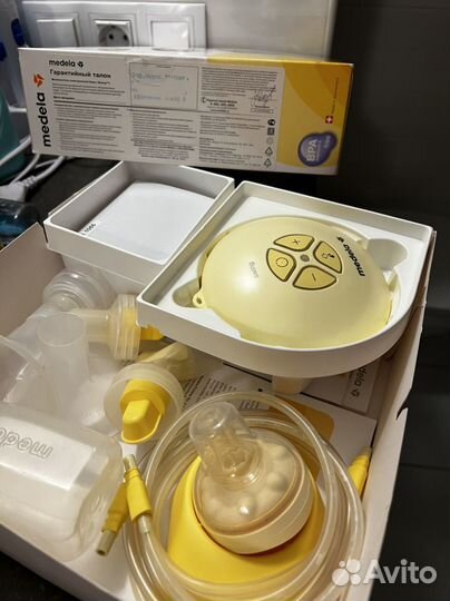 Молокоотсос medela swing электрический