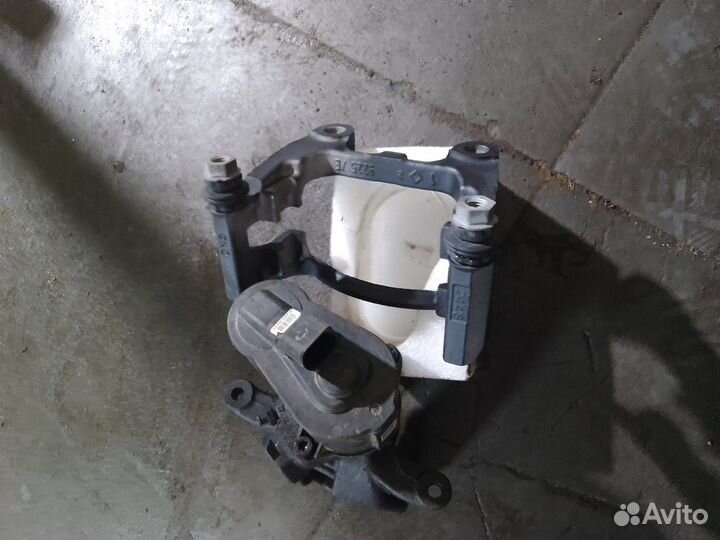 Суппорт тормозной Фольксваген тигуан