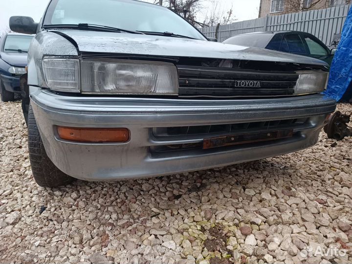 Бампер передний Toyota Corolla e90 liftbec