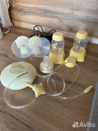 Молокоотсос medela электрический