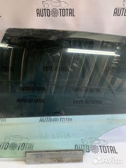 Стекло двери заднее левое Opel Astra H