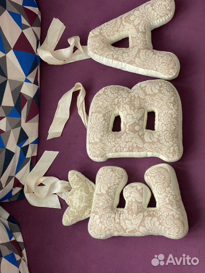 Именные подушки-буквы Ева из ткани на кроватку