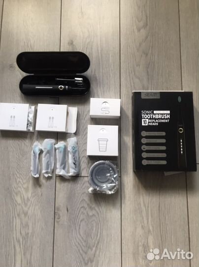 Электрическая зубная щетка новая