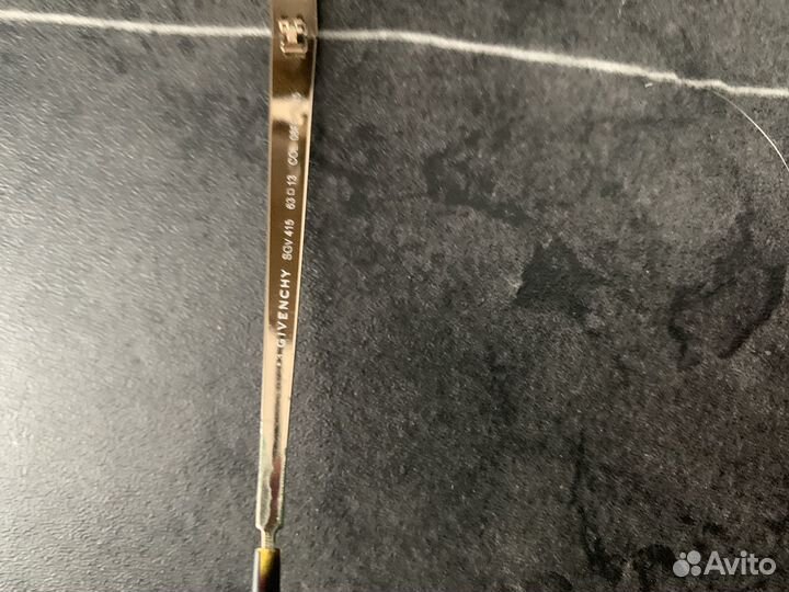 Солнцезащитные очки Gucci