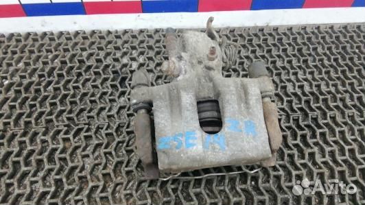 Суппорт тормозной задний правый nissan primera P12