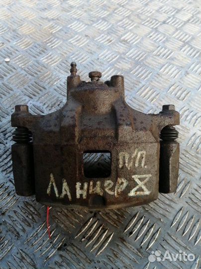 Суппорт передний правый Mitsubishi Lancer CY 1.8