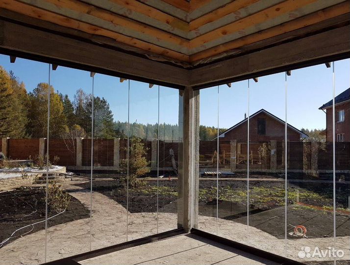 Безрамное остекление домов