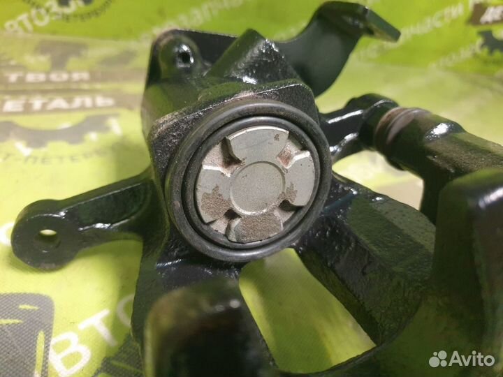 Суппорт со скобой задний левый Kia Rio 3 Solaris