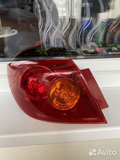 Фонарь задний левый Mazda 3