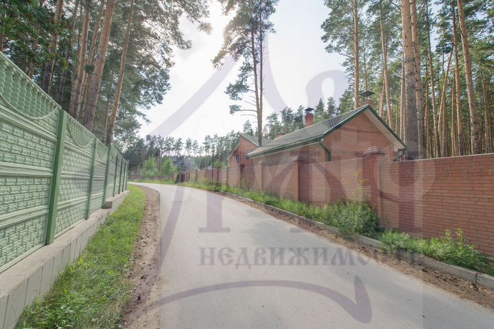 Коттедж 385 м² на участке 15 сот.