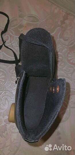 Роликовые коньки