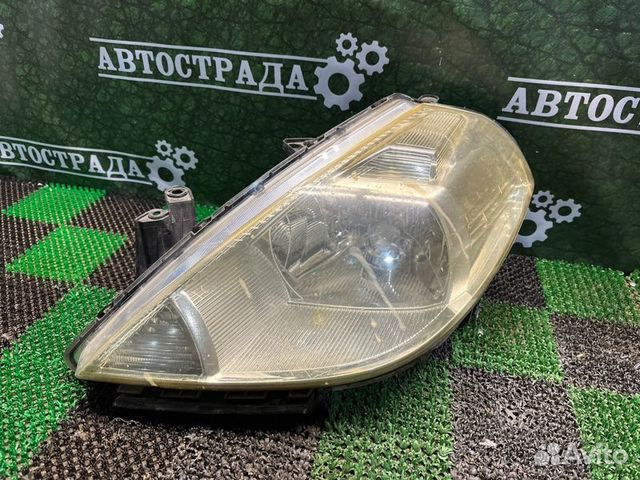 Фара левая Nissan Tiida C11