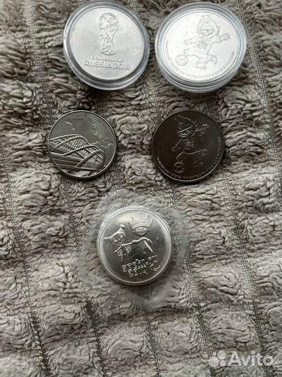 Монета Сочи разные