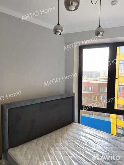 Кровать с подъемным механизмом