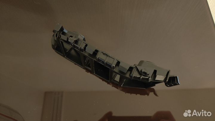 Кронштейн переднего бампера L VW Tiguan 5NU807183