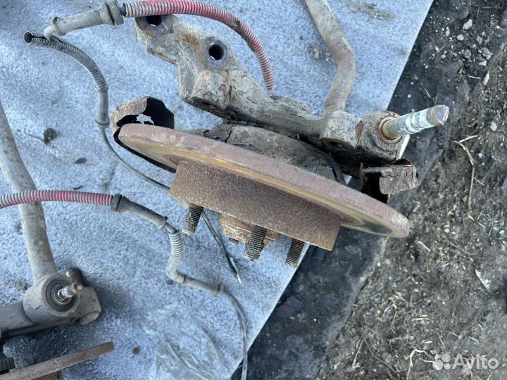 Задний кулак ступица Kia Spectra