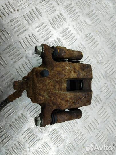 Суппорт задний левый Suzuki Grand Vitara 2.4 J24B