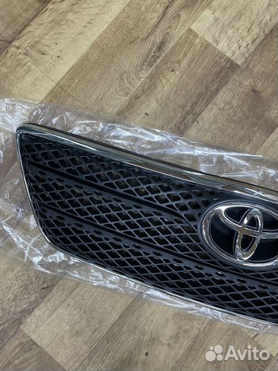 Решетка радиатора Toyota Corolla 120