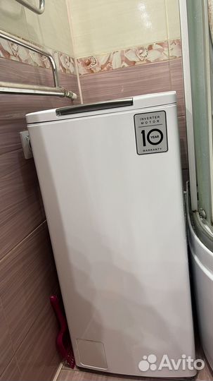 Стиральная машина с вертикальной загрузкой