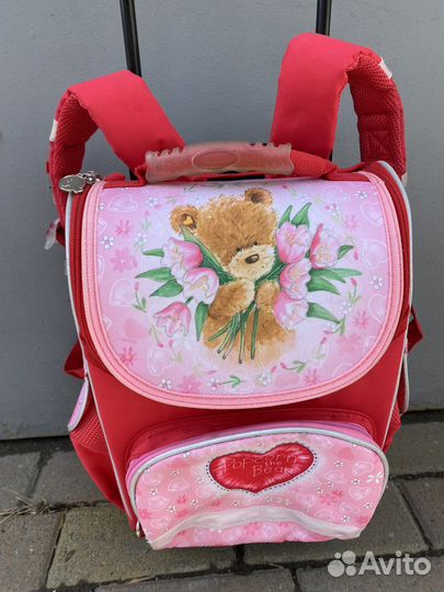 Рюкзак на колесиках,с большой выдвигающейся ручко