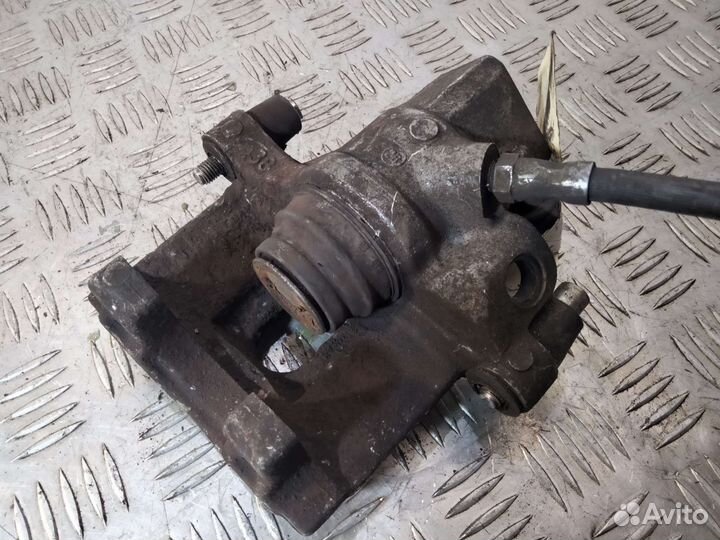 Суппорт задний левый Форд Фокус 2