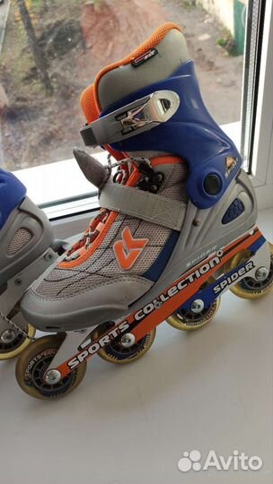 Роликовые коньки