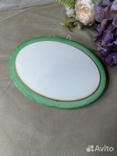 Картина в овальной раме