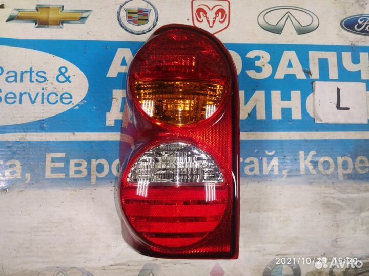 Фонарь левый оранжевый Jeep Liberty KJ 02-04