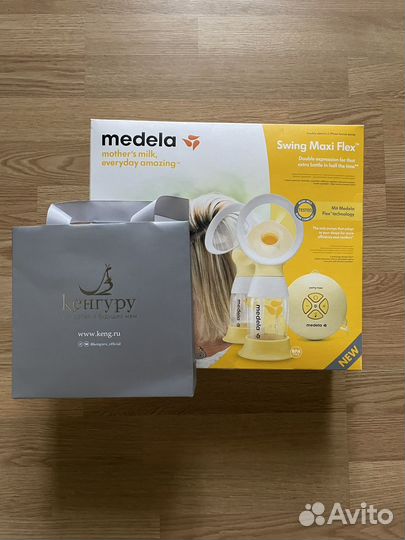 Молокоотсос medela электрический