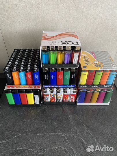 Зажигалки разные много