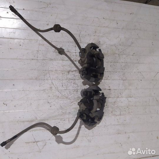 Суппорт тормозной передний Renault Logan 2 седан